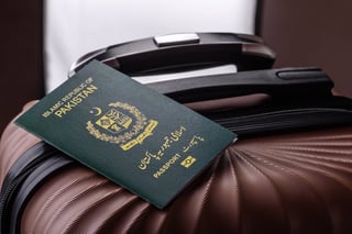 international passport of a citizen of pakistan on a suitcase-departure from-the airport international passport of a citizen of pakistan on a suitcase-departure from-the airport