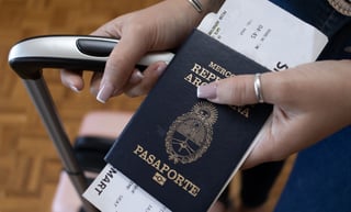 Young Girl Showing The Argentine Passport With Her Travel Bags Translation Passport