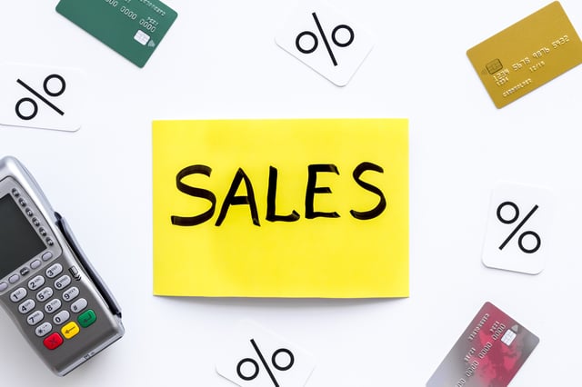 Letrero de venta con terminal de pago