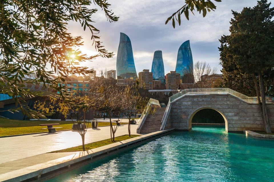 Panoramic view of Baku, from the old city looking at Flame Towers at night