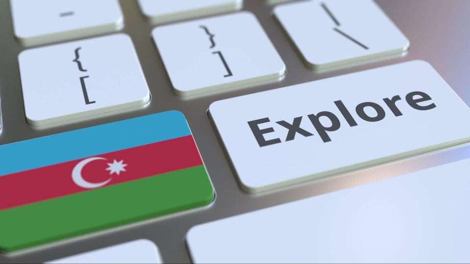 EXPLORE word and national flag of Azerbaijan on the buttons of the keyboard